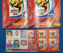 2010 Panini World Cup South Africa Football Sticker Album, 1 x complete and 1 x empty albums, plus 4