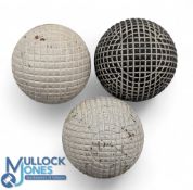 3x gutty golf balls - 2x with square mesh pattern and a fine mesh pattern example - 2x retaining