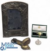 Golf Collectables: a good collection with examples of a silver hallmarked fronted golf embossed