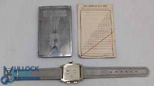 An unusual 'Domatic' wrist mounted golf scorer, with a plated golf score holder and an East Brighton