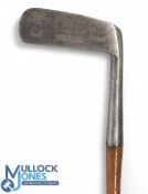 A Compston 100 percent putter stamped with the Alex Patrick Leven mark, well made logo and May &