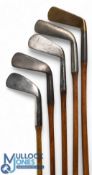 Interesting collection of 4x Bussey Golf Clubs to incl an early concave faced lofting iron, round