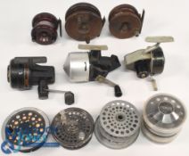 A large collection of reels and spools, as follows: Daiwa 120m LHW close faced reel, runs okay.