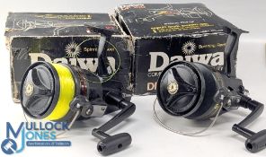 Pair of vintage Daiwa DF100 spinning reels, front drag, full bail, optional check, in maker's boxes,