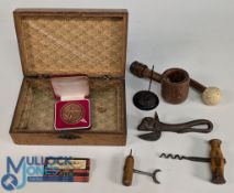 Wooden box of period Cork Screws, bottle openers nutcracker, bill spike, golf tees