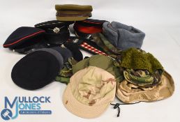 Selection of Military Headgear to include Royal Corps of Transport, Royal Artillery, Russian,