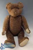 Period Large Jointed Straw Filled Teddy Bear, with dark brown fur, 5 joints, possibly a European