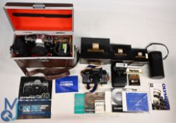 Olympus Cameras to include OM40 OM10 with Manual Adapter, T20 Flashgun, Power Winder 2, 50mm Lens (