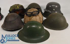 Military Helmets Kavlar helmet Nato camo, and Desert Camo example, Steel Helmets some without liners