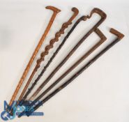 Selection of Walking Sticks Some natural examples from trees, carved snake, Crook all from various