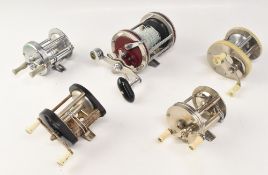 A collection of baitcasting and multiplier reels, all working well, as follows: Shakespeare