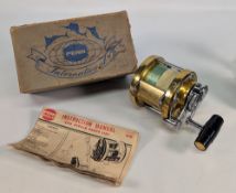 Penn International 50 gold finish big game reel, in little used condition, with strike and preset