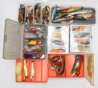 A large collection of artificial baits, as follows: Abu box plugs, Toby's and Mepps. Box with Flying