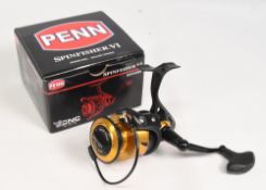 Penn Spinfisher VI spinning reel SSVI4500 in black and gold finish, folding handle - appears with