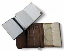 A pigskin fly wallet with tools to front pocket, see through pouches, Wheatley metal plates with fly