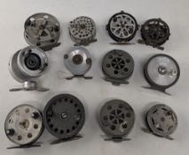 Quantity of alloy and pressed metal fly and trotting reels, including couple of interesting