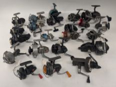 Varied collection of vintage spinning reels, including Continental and USA models, brands include