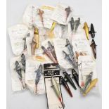 Plastic box with 34 unused Gordon Griffith one-piece plastic Devons, various sizes and colours. In