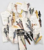 Plastic box with 34 unused Gordon Griffith one-piece plastic Devons, various sizes and colours. In