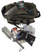 Stillwater Fishing Tackle Bag, a multi pocket canvas bag in need of a clean with a mixed selection