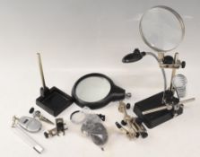Fly fishing desk top accessories including led light and magnifying glass, various clips & line