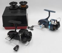 2x Garcia Mitchell fixed spool reels - features a 301 in black RHW t/w a 411A reel in blue finish