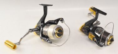 Pair of Penn Captiva CV5000 saltwater spinning reels, 11 bearing, gold accents, good used condition.