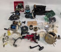 Mixed lot of vintage spinning & multiplier reels, condition varies, models by Mitchell, Shakespeare,