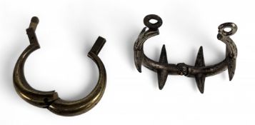 Pair of vintage tackle releasers, a brass example with hinged latch, and a nickel examples with