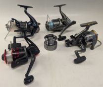 Four modern spinning reels - a Shakespeare Brutus saltwater reel, alloy skirted spool, a Vega