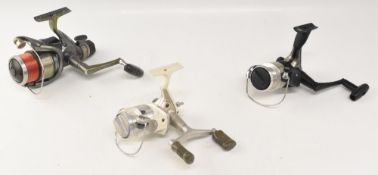 3x Shimano spinning reels, 4000 XTR twin power with fighting drag, a 1000 model with twin handle,