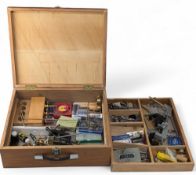 Wooden Fly-Tying Box with a quantity of tools, scissors, tweezers, vices with claps gallows stands