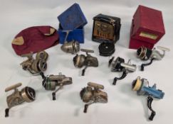 Collection of JW Young reels including the Ambidex No.1, No.2 and casting reel, Delmatic, Felton