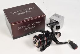 Shimano Stradic C14+ 2500RA spinning reel and spare spool with rear adjuster, bail arm, appears with