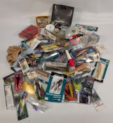 Fishing Tackle Collection to include carded examples, Rapala Shakespeare plugs, Mepps, spinners,