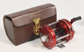 ABU Ambassadeur 6000 multiplier reel in red and chrome finish, foot stamped 050600, star drag,