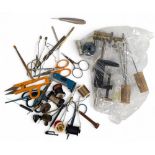 A large collection of fly tying tools and equipment, as follows: Brass tube fly vice with a