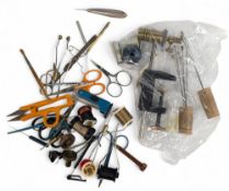 A large collection of fly tying tools and equipment, as follows: Brass tube fly vice with a