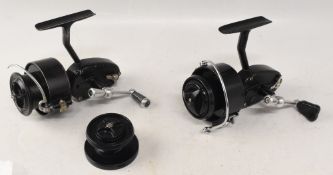 2x Mitchell fixed spool reels a 300 model stamped 5220099 to the foot, and another similar devoid of