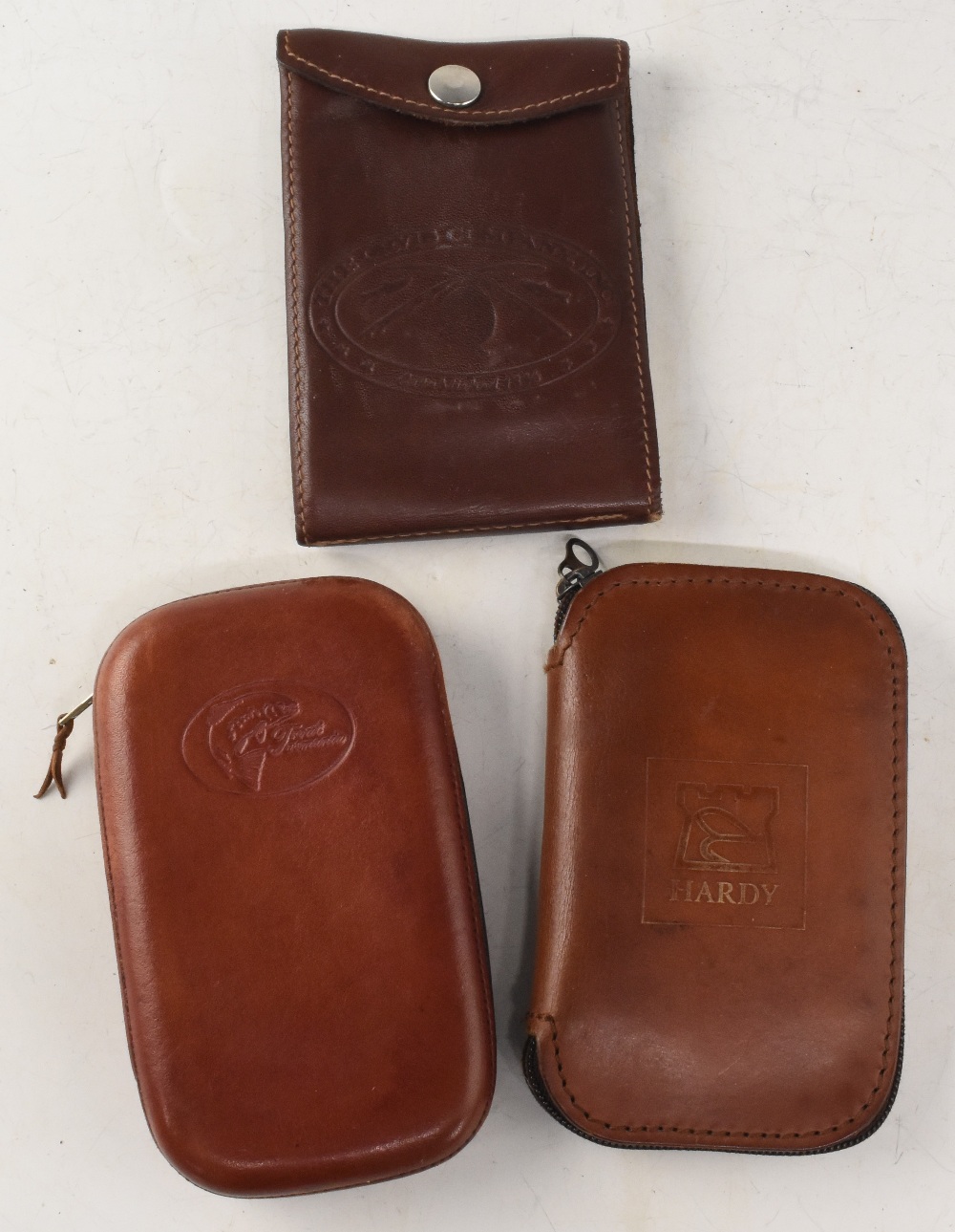 Hardy Alnwick block leather wool lined zip fly case 4" x 6". Orvis leather leader wallet with 6