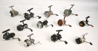 Large collection of Continental vintage spinning reels, including a Cigno LHW half bail model, a