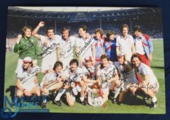 West Ham Utd 1980 FAC Winners colour photograph of the team with the trophy on the pitch at Wembley,