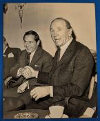 1969 b&w press photograph 20cm x 25cm featuring Matt Busby shaking the hand of Wilf McGuinness as