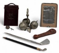 Vintage Golf Collectables, to include a Printator golf scorecard in metal wallet, a golf ball teamed