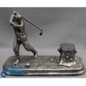 A fine white metal Golfing Inkwell, early 20th century, in the form of a golfer about to hit a