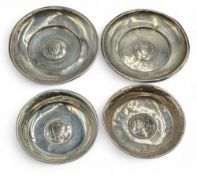 1929-1934 WGC Hallmarked Silver Birmingham four small Golf Club Awards pin dishes, with age