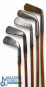 Interesting collection of 4x Bussey Golf Clubs to incl an early concave faced lofting iron, round