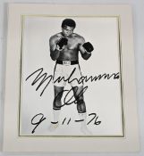 Original autographed Muhammad Ali Photograph. This iconic photo of the Champion Boxer well known