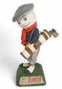 Original Dunlop Man Advertising Golf Figure incl a wooden base to the plinth, brass ring holding the