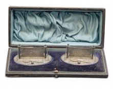 Early Lawn Tennis Knife Rests: white metal nets with tennis rackets and ball - marked RD 15049 -